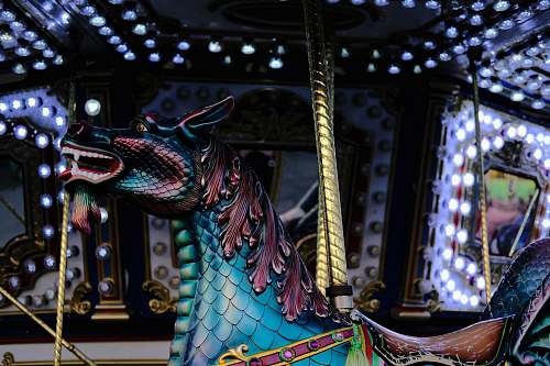 leisure activities teal dragon decor carousel